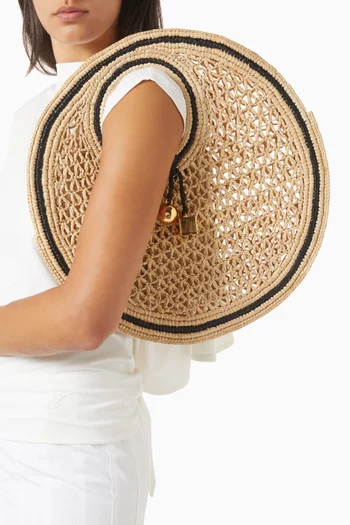 The Spiaggia Small Round Bag in Raffia