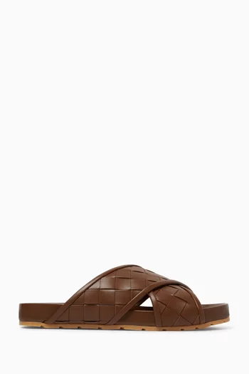 Tarik Mules in Intrecciato Leather