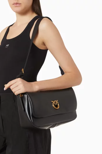 Click Soft Baguette Crossbody Bag in Leather