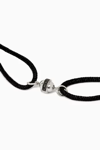Single Atom Bracelet on a Rope