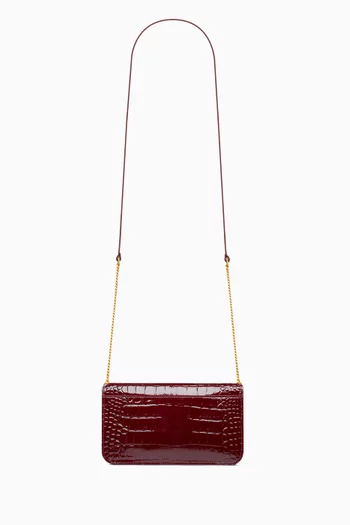 Cassandre Phone Holder in Crocodile-embossed Patent Leather