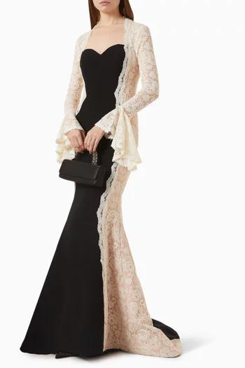 A crepe fish-cut gown featuring a sweetheart neckline and a fitted silhouette, finished with delicate lace sleeves and layered cuffs, adorned with crystal embellishments.:BLK:M|220069961