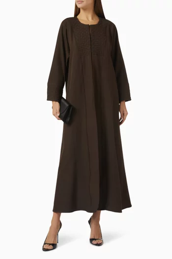عباية بأجزاء شبكية وطيّات كريب