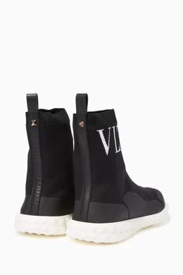 Buy Valentino Garavani Black Black VLTN High-Top Sneakers for