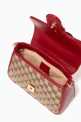 Buy Gucci Red Mini GG Marmont Top Handle Bag in Canvas for Women