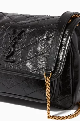 Buy SAINT LAURENT Black Baby Niki Bag in Crinkled Vintage Leather for Women Online Ounass Kuwait