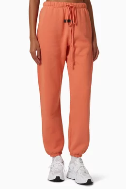 Buy Fear of God Essentials Pink Unisex Sweatpants in Fleece for Women Online Ounass Kuwait