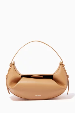 Buy YUZEFI Neutral Mini Fortune Cookie Shoulder Bag in Bovine