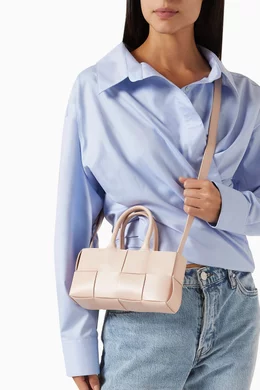 Buy Bottega Veneta Pink Mini East-West Arco Tote Bag in