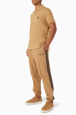 Buy Tommy Hilfiger Neutral Monotype Tape Sweatpants in Cotton for