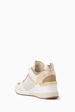 Buy Michael Kors Gold Georgie 65 Wedge Sneakers in Leather Mesh