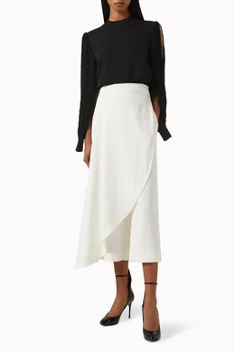 Buy Alaïa White Asymmetric Skirt Pants in Stretch Cady for