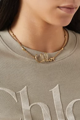 ネックレス・ペンダント Chloe Chloe Iconic Necklace In Brass Chloé The Chloé Charms Necklace in Vintage gold | Chloé US