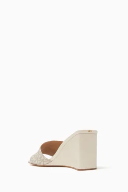 【送料&関税込】Michael Kors Merriam Wedge Clog In Canvas Wi Buy Michael Kors Neutral Merriam Wedges in Logo Canvas for