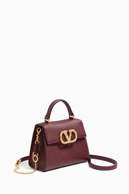 Buy Valentino Garavani Purple Small VSLING Top-handle Bag in