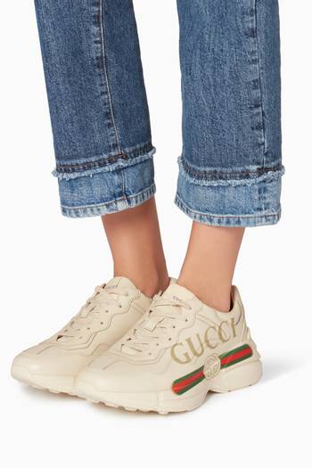 hover state of Ivory Rhyton Gucci logo leather Sneakers      