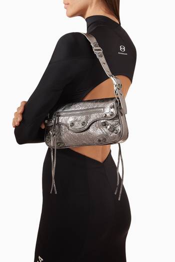hover state of Small Le Cagole Sling Bag in Metallic Arena Lambskin
