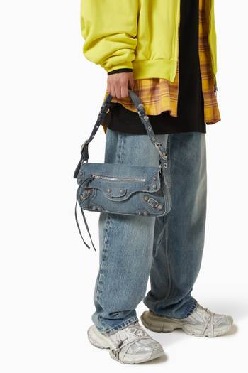 hover state of Small Le Cagole Sling Bag in Denim
