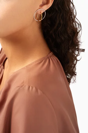 أقراط ساترن متوسطة مطلية بذهب عيار 18