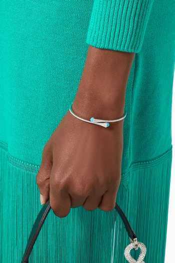 سوار كليو رفيع سهل الارتداء مرصع بماس وكالسيدوني أزرق ذهب أصفر عيار 18