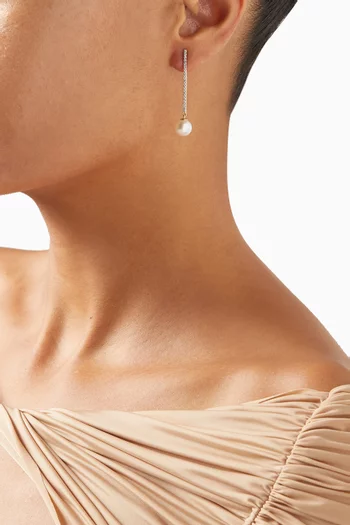 أقراط متدلية بتصميم قضيب مرصع بماس ولؤلؤ ذهب أصفر عيار 14