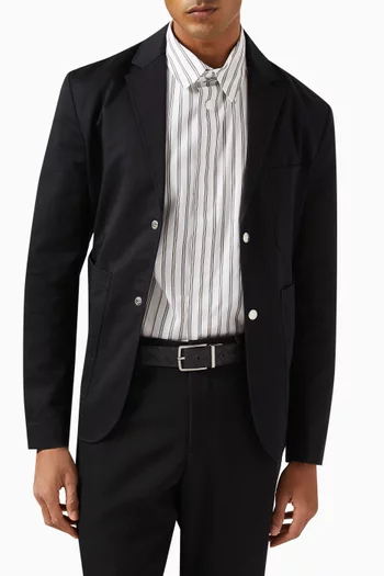 حزام بوجهين بتصميم مجدول جلد