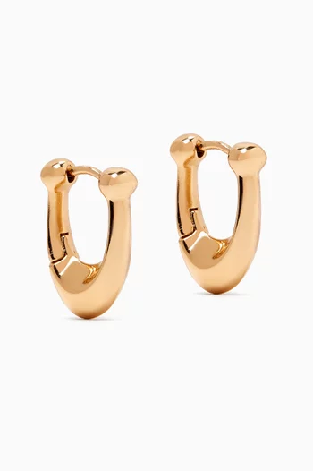 Signature C Huggie Earrings in Metal