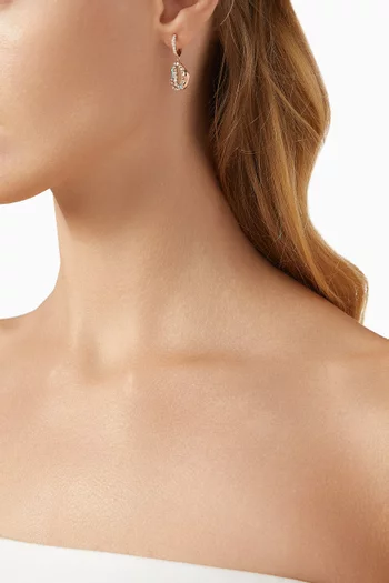 أقراط دائرية بتصميم مموج مزين بالمينا والماس ذهب وردي عيار 18