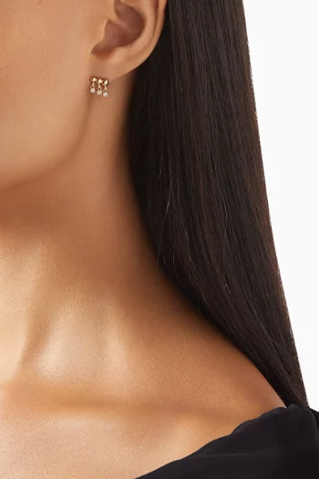 أقراط بيدازل مرصعة بثلاث ماسات ذهب أصفر عيار 14