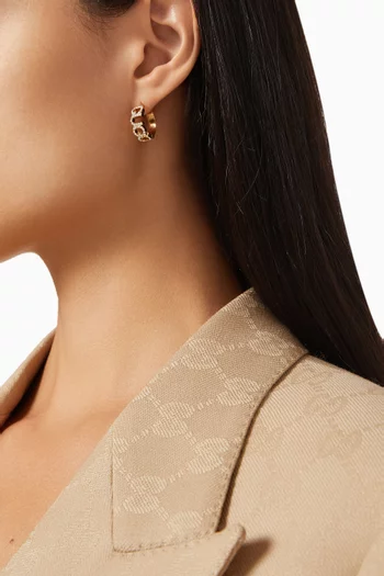 أقراط دائرية بتصميم حروف GUCCI معدن