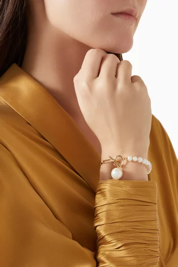 سوار كيكو بتصميم مزين بلؤلؤ وحلقات بشكل مشبك ذهب عيار 18