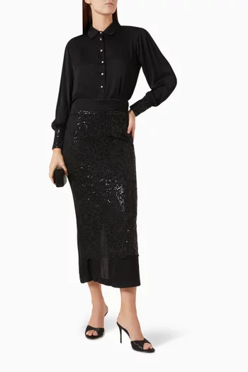 بلوزة مطرزة بالترتر