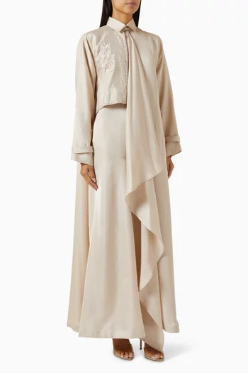 فستان طويل بنمط قميص مزين بدرابيه وتطريزات