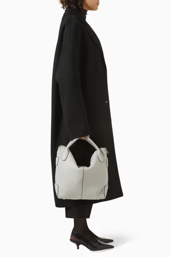 حقيبة دي سوينج متوسطة بيد علوية جلد