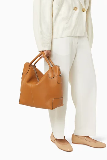 حقيبة دي سوينج متوسطة بيد علوية جلد