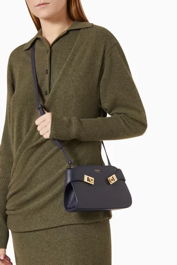 Mini Hug Crossbody Bag in Leather