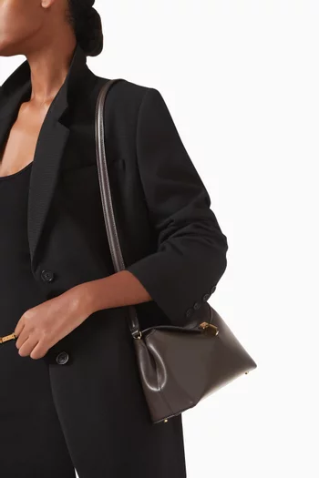 كلاتش بقفل على شكل حرف T جلد ناعم