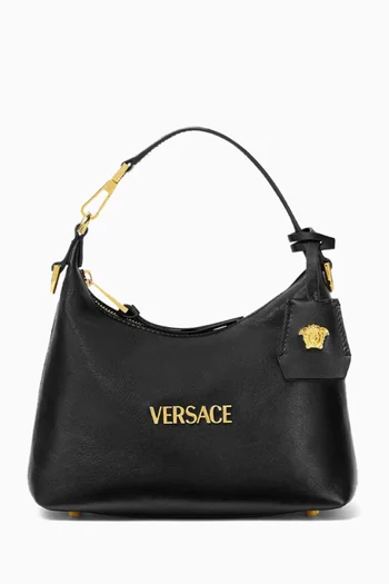 حقيبة هوبو بشارة جلد نابا