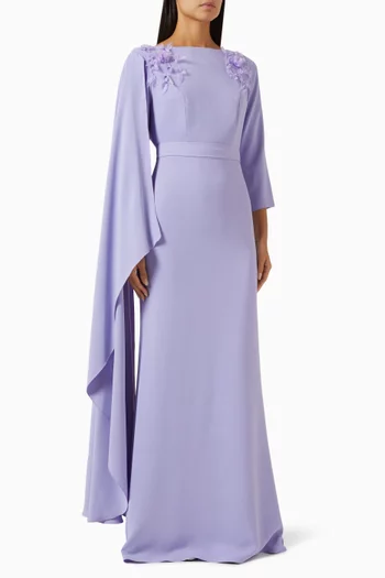 فستان طويل مزين بزهور بارزة