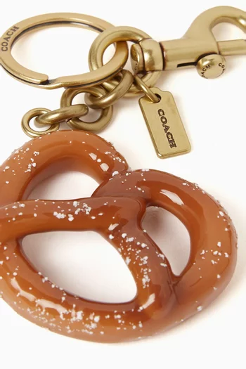 حلية حقيبة صغيرة بتصميم بريتزل نحاس بلون ذهبي