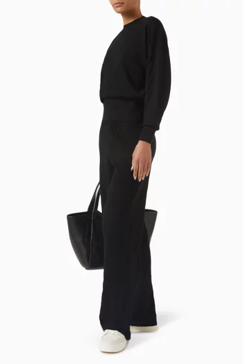 سترة بأساور عريضة منسوجة بغرزة الضفيرة