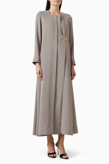 عباية بأزرار على شكل نجمة البحر