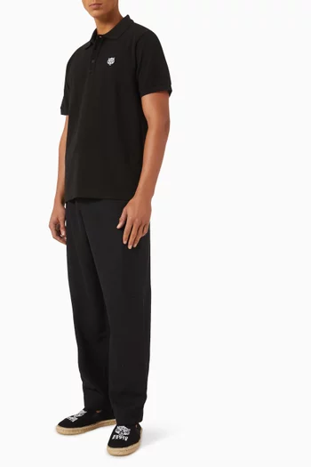 تي شيرت بولو بقصة ضيقة مزين بنمر يبتسم قطن بيكيه