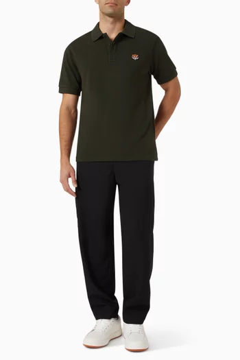 تي شيرت بولو بقصة ضيقة مطرز بشعار نمر يبتسم قطن