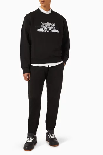 سويت شيرت مطرز بشعار نمر يبتسم قطن