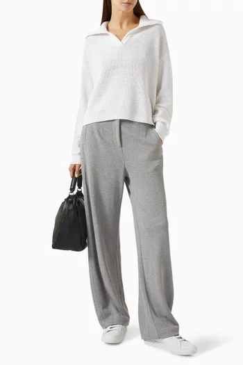 بنطال بقصة ساق واسعة بيكيه لامع