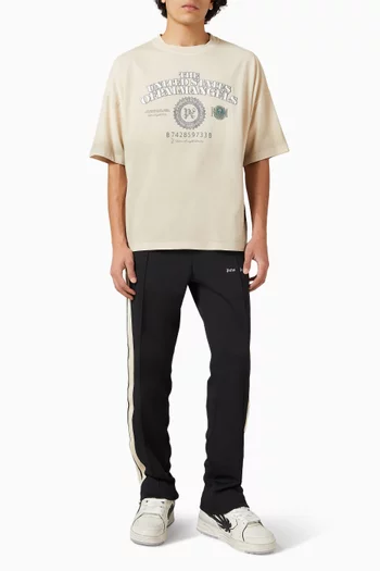 تي شيرت بقصة فضفاضة وطبعة دولار قطن