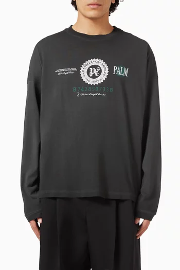 تي شيرت بقصة فضفاضة وطبعة دولار قطن