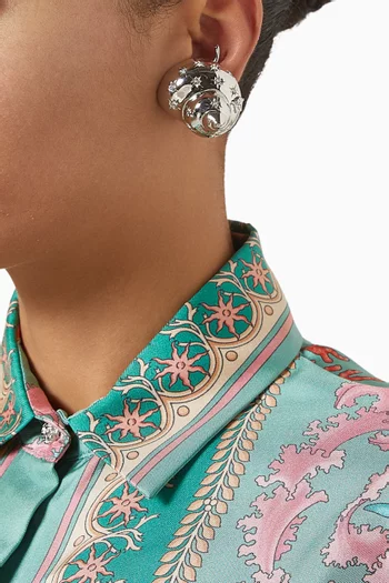 أقراط آيكونز دي لا مير مرصعة بالكريستال