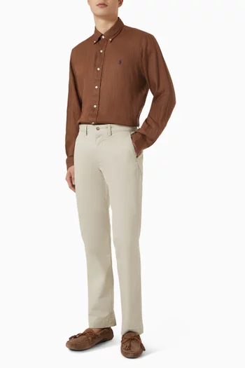 قميص بأزرار وتطريزات